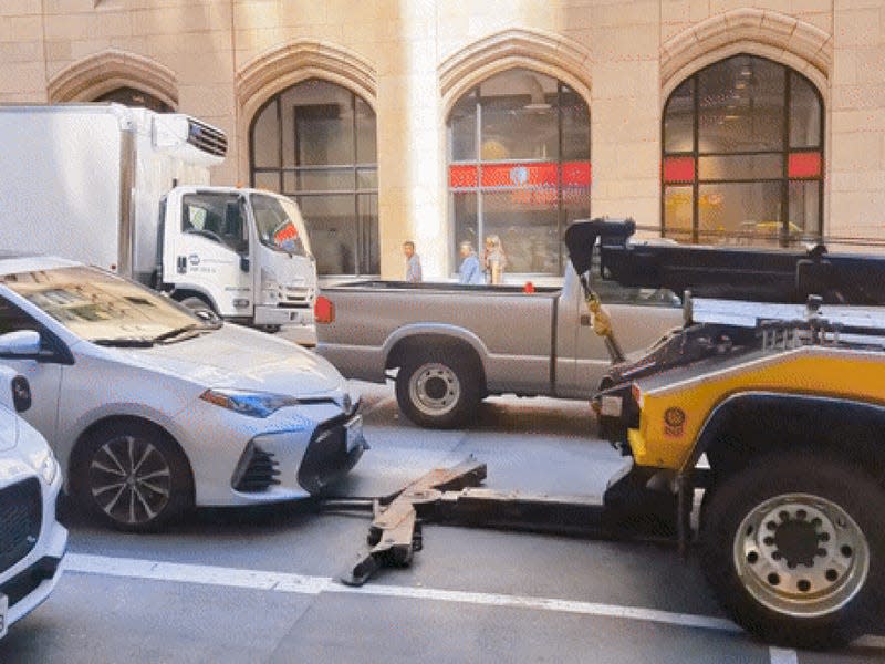 Gif: Reddit u/storyinmemo (<a class="link " href="https://www.reddit.com/r/sanfrancisco/comments/1c007qf/specialty_tow_trying_to_grab_an_occupied_car_from/" rel="nofollow noopener" target="_blank" data-ylk="slk:Other;elm:context_link;itc:0;sec:content-canvas">Other</a>)