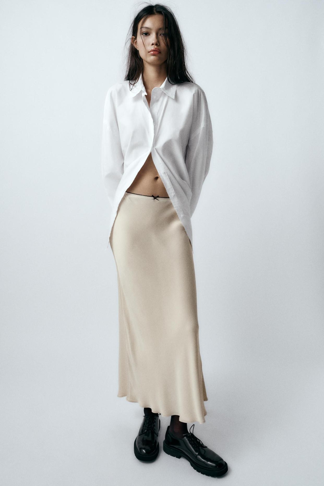 <p><a href="https://go.redirectingat.com?id=74968X1596630&url=https%3A%2F%2Fwww.zara.com%2Fus%2Fen%2Fsatin-effect-slip-skirt-p04661400.html&sref=https%3A%2F%2Fwww.harpersbazaar.com%2Fcelebrity%2Flatest%2Fa60524899%2Fspain-queen-letizia-pearl-hued-satin-skirt-spring-staple%2F" rel="nofollow noopener" target="_blank" data-ylk="slk:Shop Now;elm:context_link;itc:0;sec:content-canvas" class="link rapid-noclick-resp">Shop Now</a></p><p>Satin Effect Slip Skirt</p><p>zara.com</p><p>$39.90</p>