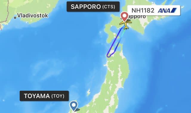 Japan Passenger plane turns back to airport after cockpit window