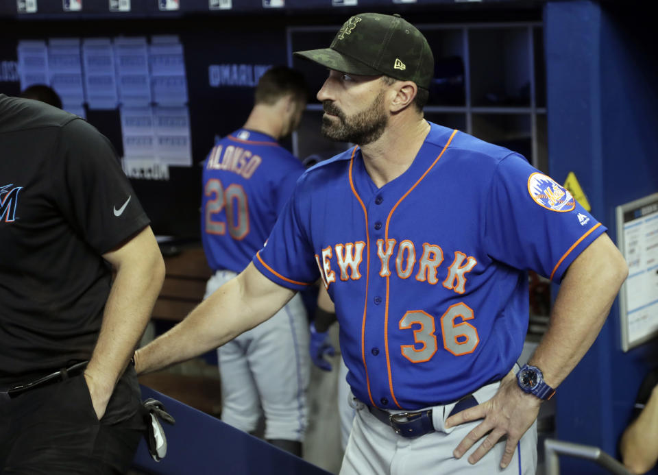 New York Mets manager Mickey Callaway stands in the dugout before a baseball game against the Miami Marlins, Sunday, May 19, 2019, in Miami. (AP Photo/Lynne Sladky)