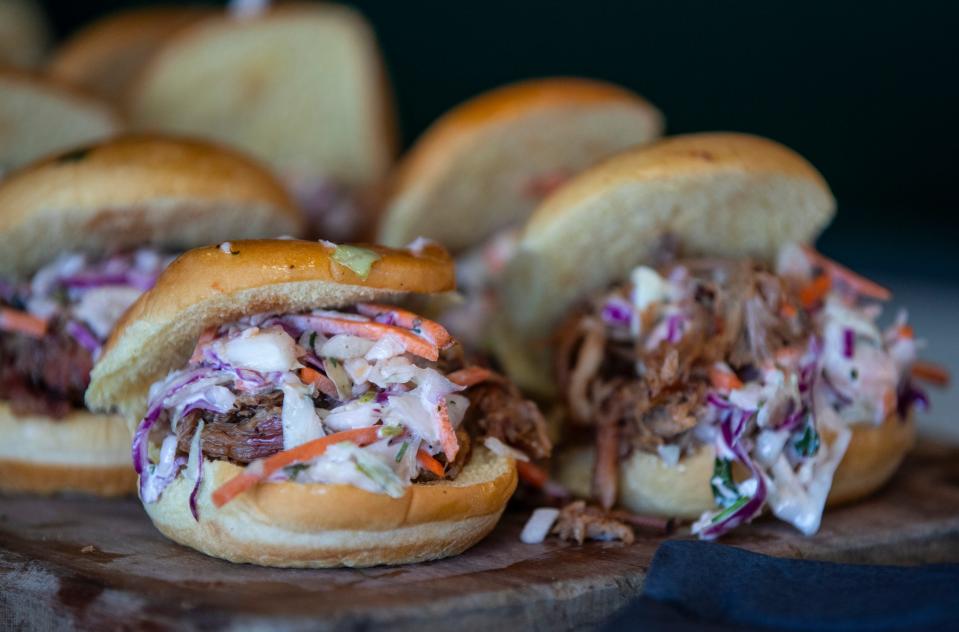 Pork sandwiches were offered during the grand opening Thursday of the Pig Beach BBQ at 1201 River Road. Aug. 31, 2023.  