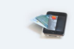 CWN07F digital wallet - iphone acting as a wallet holding 3 credit cards mobile payments iphone; wallet; digital; currency; mone