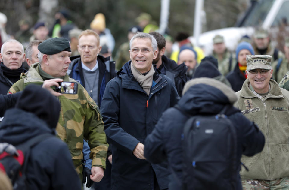 NATO Secretary General Jens Stoltenberg, center, visits the NATO-led military exercise Trident Juncture on Distinguished Visitors Day in Trondheim, Norway, Tuesday Oct. 30, 2018. (Gorm Kallestad/NTB Scanpix via AP)