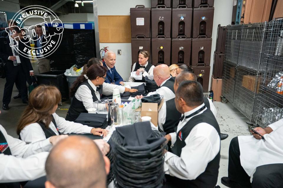 Biden speaks with conference center workers before taking the stage at the 2019 Unidos US Annual Conference, on Aug. 5, 2019, in San Diego.