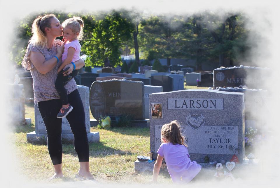 Taylor Bromberg, 26, visited the grave of her fiancé Eric Larson  with her daughters, Adriana Nicole, 5, and  Mikayla Grace, 2. Larson was killed by a suspect fleeing police.