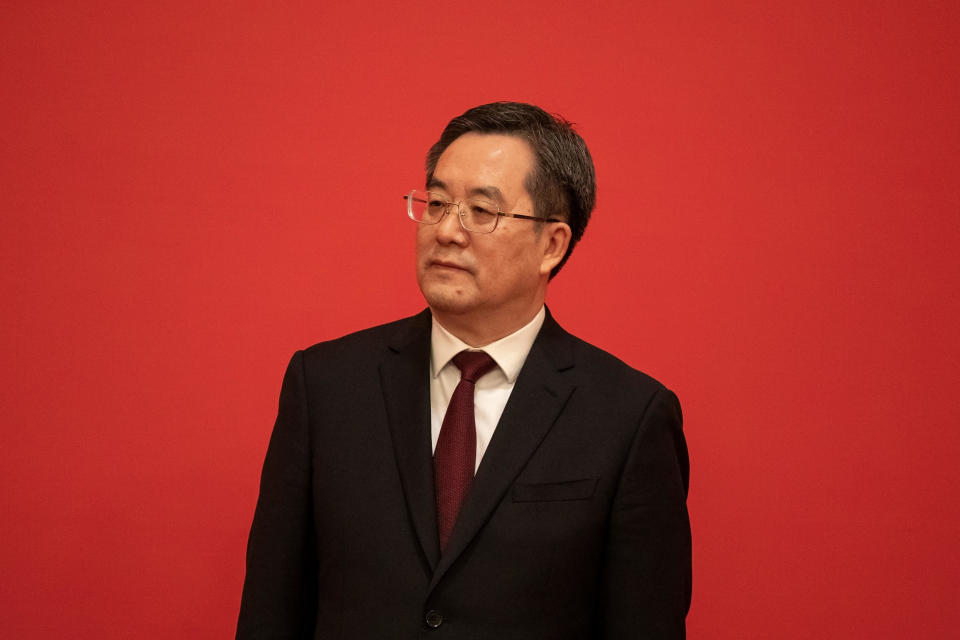 Ding Xuexiang, member of the Communist Party of China's new Politburo Standing Committee, on stage during its unveiling at the Great Hall of the People in Beijing, China, on Sunday, Oct. 23, 2022. / Credit: Bloomberg