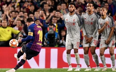 Barcelona's Argentinian forward Lionel Messi scores a free kick during the UEFA Champions League semi-final first leg football match between FC Barcelona and Liverpool  - Credit: JOSE JORDAN/AFP/Getty Images