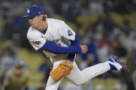 Los Angeles Dodgers starting pitcher Gavin Stone follows through on a throw to a San Diego Padres batter during the first inning of a baseball game Saturday, April 13, 2024, in Los Angeles. (AP Photo/Marcio Jose Sanchez)