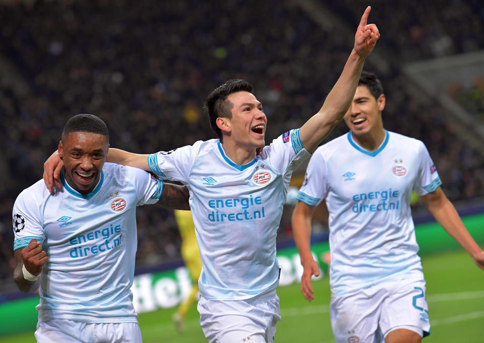 PSV's Hirving Lozano, center, celebrates after scoring his side's opening goal during the Champions League, Group B soccer match between Inter Milan and PSV Eindhoven, at the San Siro stadium in Milan, Italy, Tuesday, Dec. 11, 2018. (Daniel Dal Zennaro/ANSA via AP)