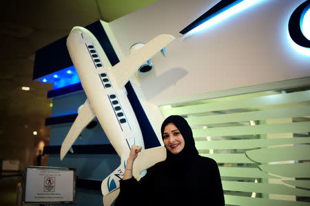 Dalia Yashar, one of the first Saudi students who registered to become a commercial pilot, stands in front of the registration centre, CAE Oxford ATC, where Saudi women can pursue their carrier as a commercial pilots, at King Fahd International Airport in Dammam, Saudi Arabia, July 15, 2018. REUTERS/Hamad I Mohammed