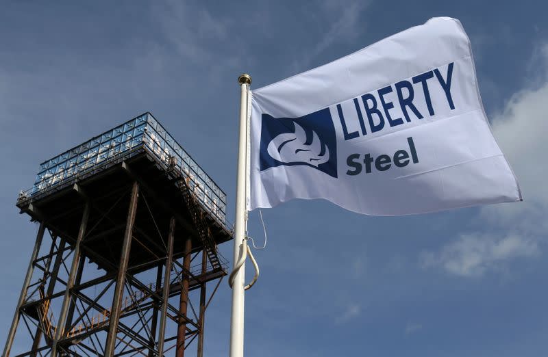 FILE PHOTO: The Liberty Steel flag flies over the steel plant in Dalzell, Scotland