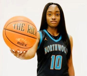Northwood's Carlisa Mitchell is starring on the court and in the classroom after depression battle.