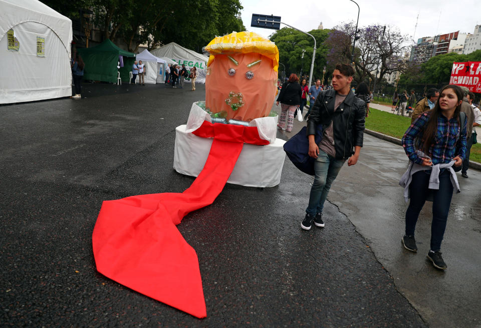 A figure made of recycled materials resembling President Trump is seen during a protest ahead of the G-20 leaders summit in Buenos Aires, Argentina, on Thursday. (Photo: Pilar Olivares/Reuters)