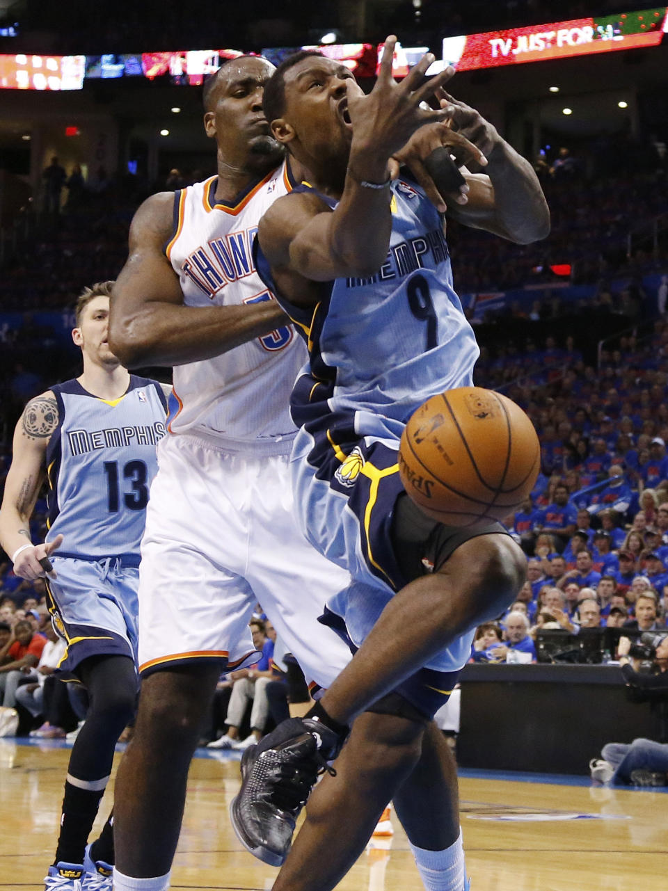 Memphis Grizzlies guard Tony Allen (9) loses the ball as he is fouled by Oklahoma City Thunder center Kendrick Perkins (5) in the first quarter of Game 7 of an opening-round NBA basketball playoff series in Oklahoma City, Saturday, May 3, 2014. (AP Photo/Sue Ogrocki)