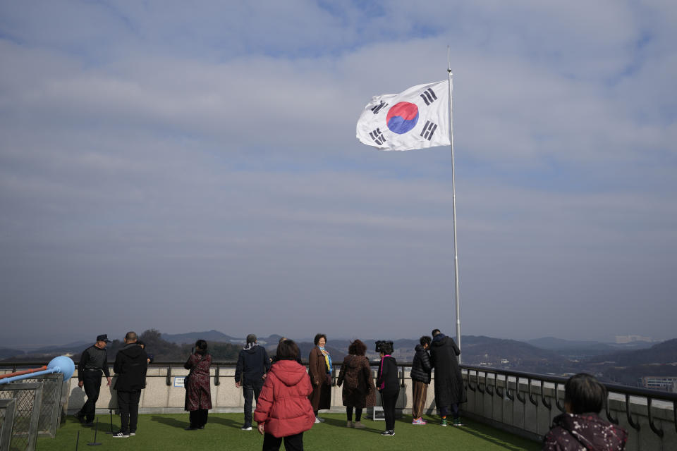 A South Korean national flag flutters in the wind at the unification observatory, in Paju, South Korea, Wednesday, Nov. 22, 2023. South Korea will partially suspend an inter-Korean agreement Wednesday to restart frontline aerial surveillance of North Korea, after the North said it launched a military spy satellite in violation of United Nations bans, Seoul officials said. (AP Photo/Lee Jin-man)