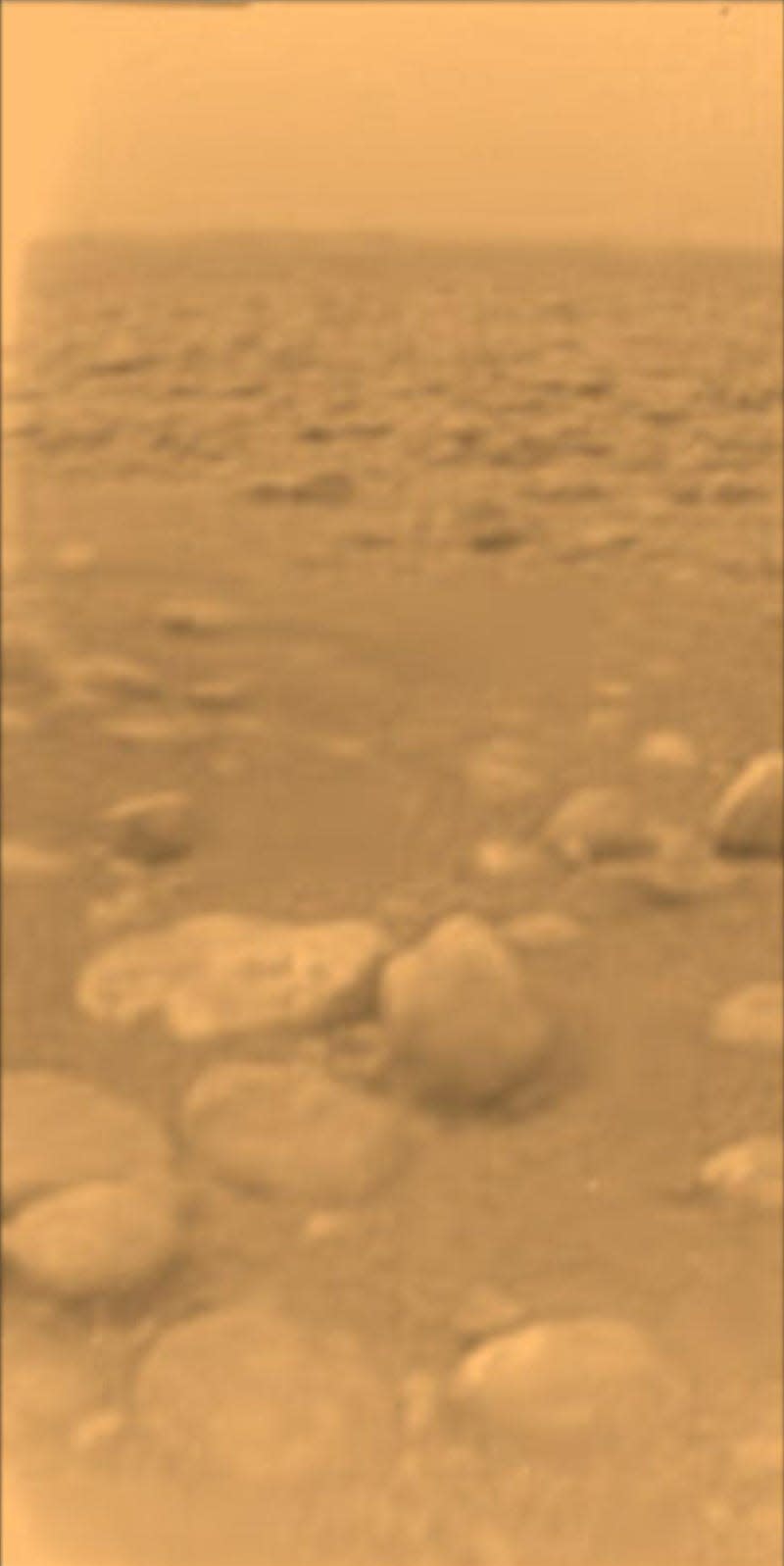 Titan's golden atmosphere, plus rocks.