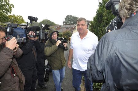 Former England soccer manager Sam Allardyce speaks to media as he leaves his home in Bolton, Britain September 28, 2016. REUTERS/Chris Neill