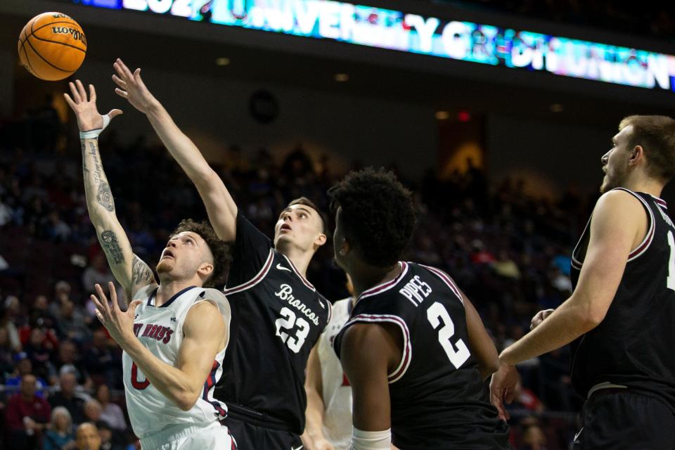 Then with Santa Clara, Parker Braun (23) defends a shot during a game against St. Mary's on March 7, 2022 in Las Vegas.