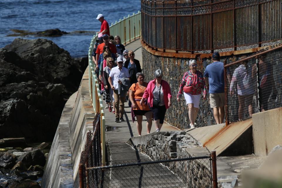 The Cliff Walk, seen here as it passes between Anglesea and the Breakers, drew a crowd on the Saturday of Memorial Day weekend.