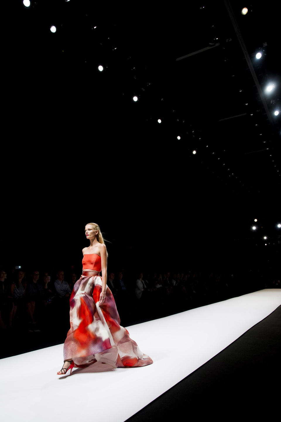 The Monique Lhuillier Spring 2014 collection is modeled during Fashion Week in New York, Saturday, Sept. 7, 2013. (Photo by Charles Sykes/Invision/AP)