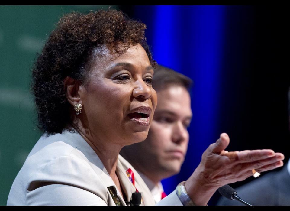 Rep. Barbara Lee, D-Calif., accompanied by Sen. Marco Rubio, R-Fla., speaks during a session entitled: 'The U.S. Congress and the Global AIDS Epidemic" Wednesday, July 25, 2012, at the XIX International AIDS Conference in Washington. (AP Photo/Carolyn Kaster)