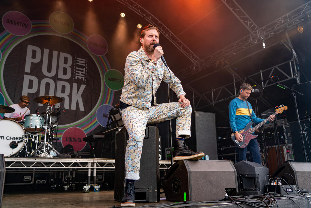 Ricky Wilson performs live on stage with Kaiser Chiefs at the Pub in The Park festival. (Photo by Bonnie Britain/SOPA Images/LightRocket via Getty Images)