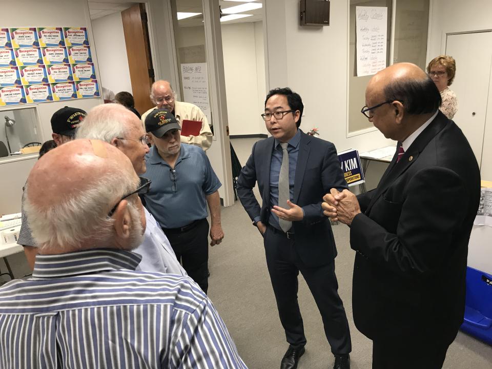 Andy Kim and Gold Star father Khizr Khan meet with local veterans at Kim’s campaign headquarters in Mount Laurel, N.J. (Photo: Andrew Romano/Yahoo News)