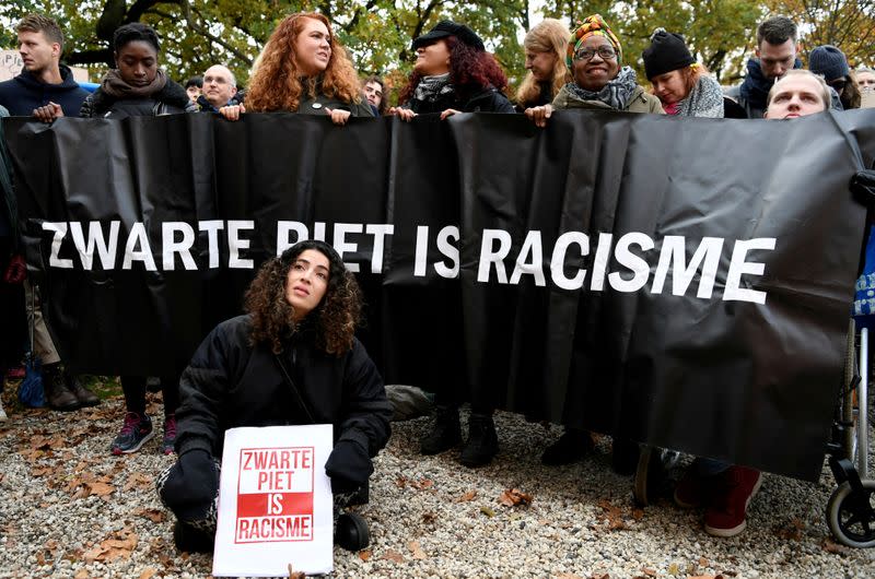 FILE PHOTO: Traditional parade with Saint Nicholas and "Zwarte Piet" (Black Pete) in The Hague