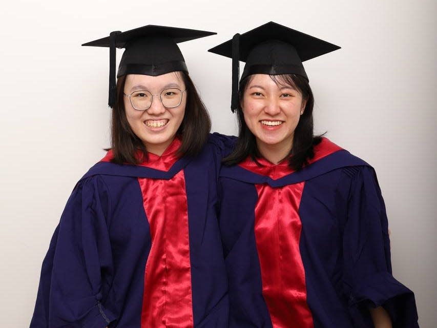 Faith Choo (right) and her best friend (left) in their graduation gowns.