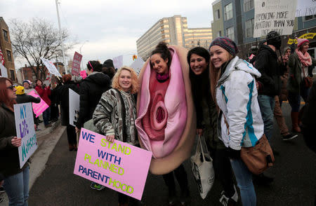 Supporters of Planned Parenthood rally outside a Planned Parenthood clinic in Detroit, Michigan, U.S. February 11, 2017. REUTERS/Rebecca Cook