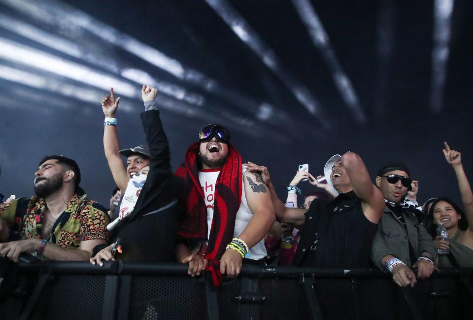 Fans enjoy the Justice performance at the Outdoor Theatre during the Coachella Valley Music and Arts Festival in Indio, Calif., Friday.