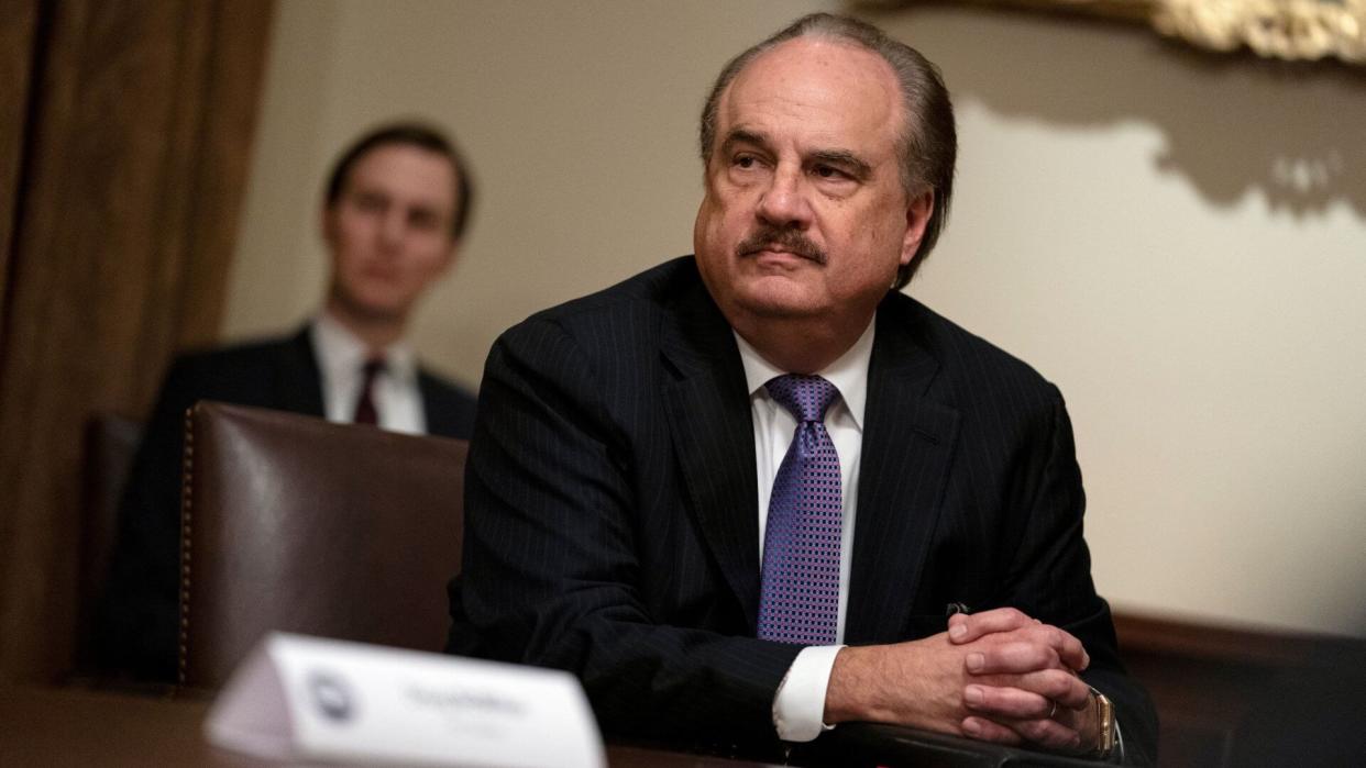 Mandatory Credit: Photo by Evan Vucci/AP/Shutterstock (10660159a)Larry Merlo listens during a meeting with President Donald Trump about coronavirus testing, in the Cabinet Room of the White House in Washington.