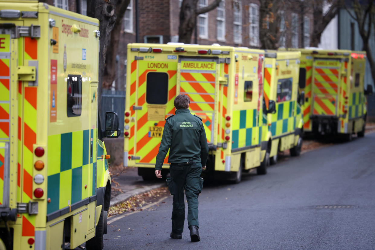 An NHS staff member walks near NHS London Ambulance Service, on the day of a planned strike, amid a dispute with the government over pay, in London, Britain December 21, 2022. REUTERS/Henry Nicholls