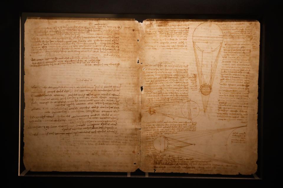This picture taken on October 23, 2019 shows Studies on the Ashen Glow of the Moon, from Leonardo Da Vincis scientific treatise Codex Leicester, during the opening of the exhibition 