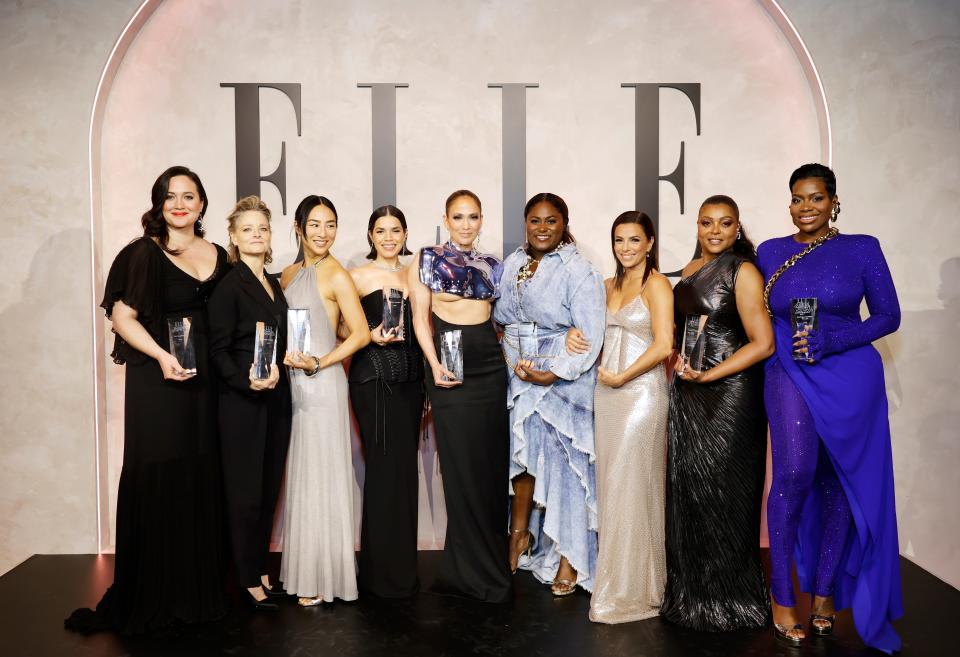 Honorees Lily Gladstone (left), Jodie Foster, Greta Lee, America Ferrera, Jennifer Lopez, Danielle Brooks, Eva Longoria, Taraji P. Henson and Fantasia Barrino pose for a group photo at Elle's 2023 Women in Hollywood Celebration at Nya Studios on Dec. 5, 2023, in Los Angeles, California.