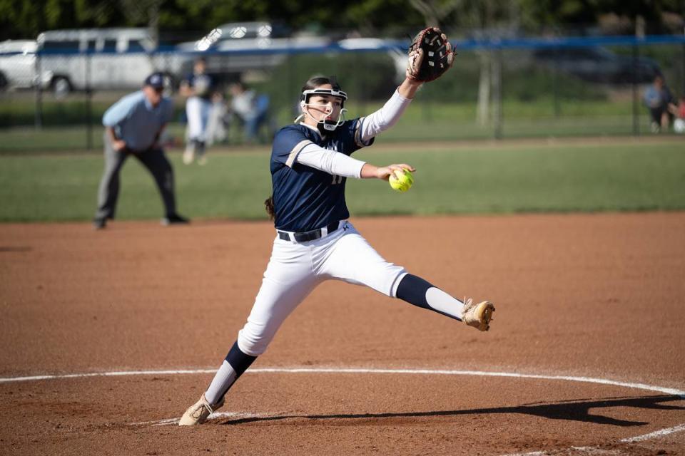 Central Catholic’s Stephanie Garcia delivers a pitch during the Valley Oak League game with Kimball at Central Catholic High School in Modesto, Calif., Tuesday, March 26, 2024. Central Catholic won the game 9-6.