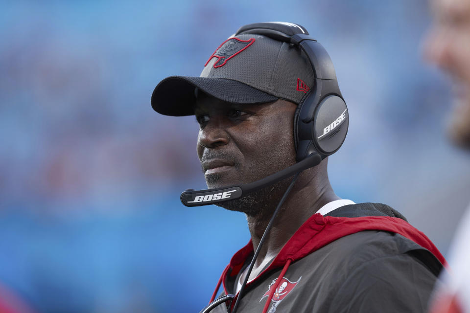 FILE - Tampa Bay Buccaneers defensive coordinator Todd Bowles watches from the sideline during the team's NFL football game against the Carolina Panthers on Dec. 26, 2021, in Charlotte, N.C. Buccaneers coach Bruce Arians has decided to retire as coach of the Buccaneers and move into a front-office role with the team, it was announced Wednesday night, March 30. Bowles will replace Arians as coach. (AP Photo/Brian Westerholt, File)