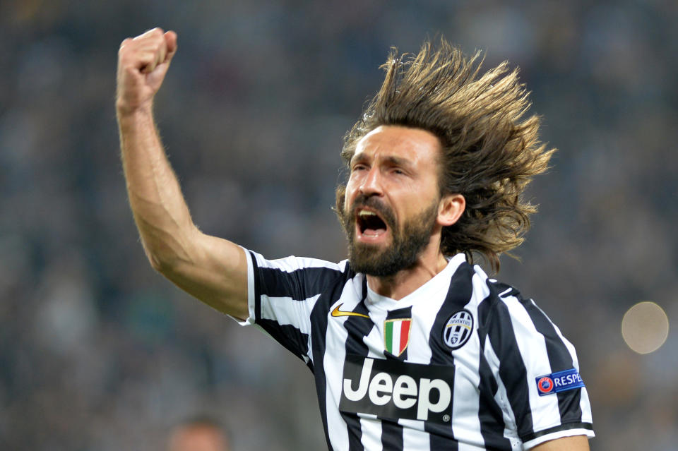 Juventus midfielder Andrea Pirlo celebrates after scoring during the Europa League quarterfinal soccer match between Juventus and Olympic Lyon at the Juventus stadium, in Turin, Italy, Thursday, April 10, 2014. (AP Photo/ Massimo Pinca)