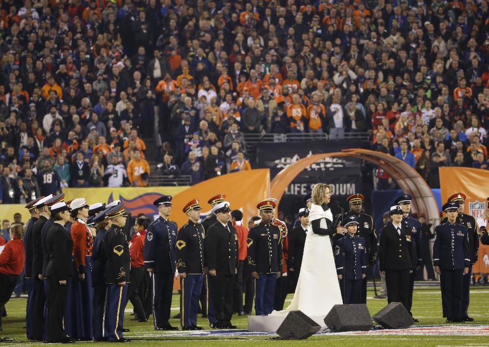 Opera singer Renée Fleming sings the national anthem before the NFL Super Bowl XLVIII football game between the Seattle Seahawks and the Denver Broncos Sunday, Feb. 2, 2014, in East Rutherford, N.J. (AP Photo/Ted S. Warren)