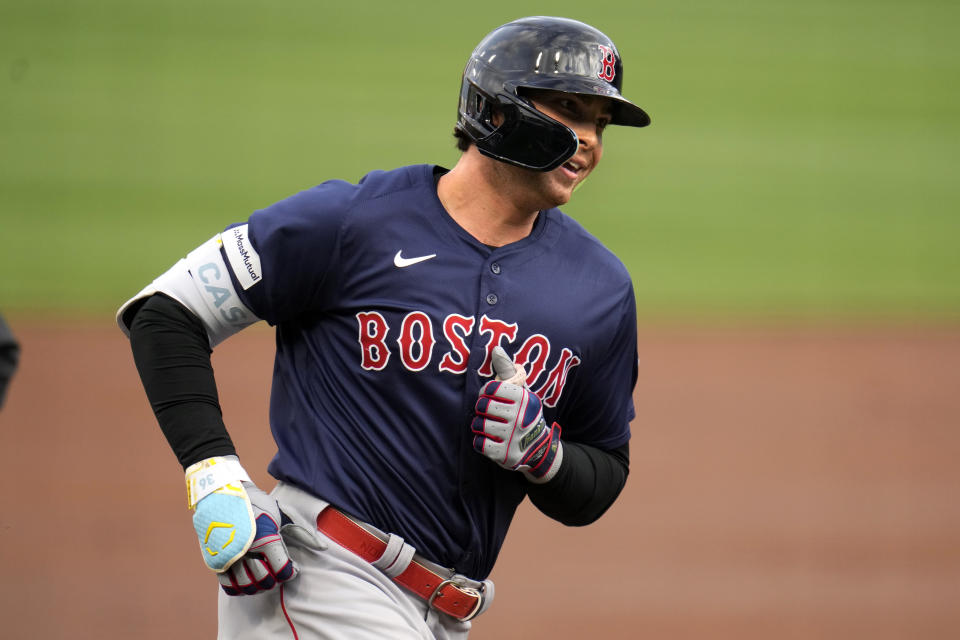 Boston Red Sox's Triston Casas rounds third base after hitting a solo home run off Pittsburgh Pirates starting pitcher Quinn Priester during the first inning of a baseball game in Pittsburgh, Friday, April 19, 2024. (AP Photo/Gene J. Puskar)