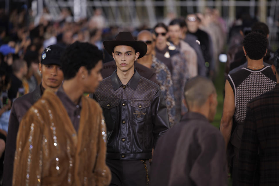 Models wear creations as part of the Louis Vuitton Spring Summer 2025 collection, that was presented in Paris, Tuesday, June 18, 2024. (Photo by Vianney Le Caer/Invision/AP)