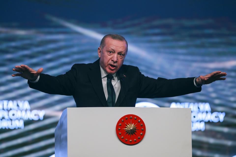 Turkish President Recep Tayyip Erdogan speaks during the opening ceremony of the Antalya Diplomacy Forum, an international relations meeting, in Antalya, Turkey, Friday, March 11, 2022. (AP Photo)