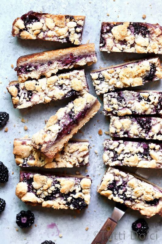 <p>Tutti Dolci</p><p>With plenty of butter, lemon zest and vine-ripened blackberries, these bars are the very essence of blackberry pie, albeit in an all too effortless crumb bar.</p><p><strong>Get the recipe: <a href="https://tutti-dolci.com/blackberry-pie-bars/" rel="nofollow noopener" target="_blank" data-ylk="slk:Blackberry Pie Bars;elm:context_link;itc:0;sec:content-canvas" class="link ">Blackberry Pie Bars</a></strong></p>