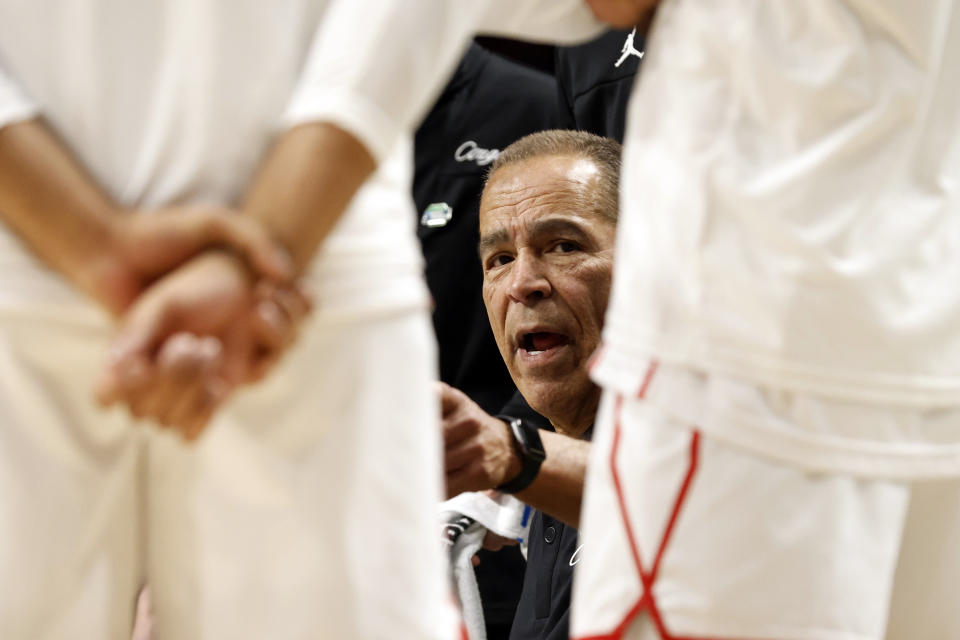 Houston head coach Kelvin Sampson talks with players during a timeout in the second half of a second-round college basketball game against Auburn in the NCAA Tournament in Birmingham, Ala., Saturday, March 18, 2023. (AP Photo/Butch Dill)