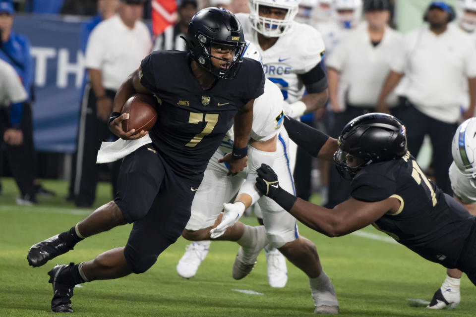 Army quarterback Jemel Jones (7) carries the ball during an NCAA college football game against Air Force in Arlington, Texas, Saturday, Nov. 5, 2022. (AP Photo/Emil Lippe)