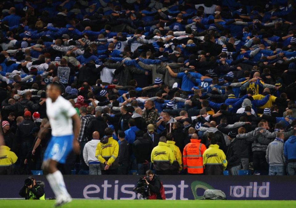 ‘Let’s all do the Poznań’ ... Manchester City fans in full flight.