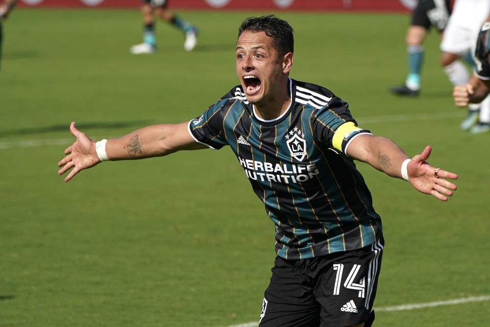 LA Galaxy forward Javier Hernandez (14) reacts after scoring a goal during the second half of an MLS soccer match against Inter Miami, Sunday, April 18, 2021, in Fort Lauderdale, Fla. (AP Photo/Lynne Sladky)