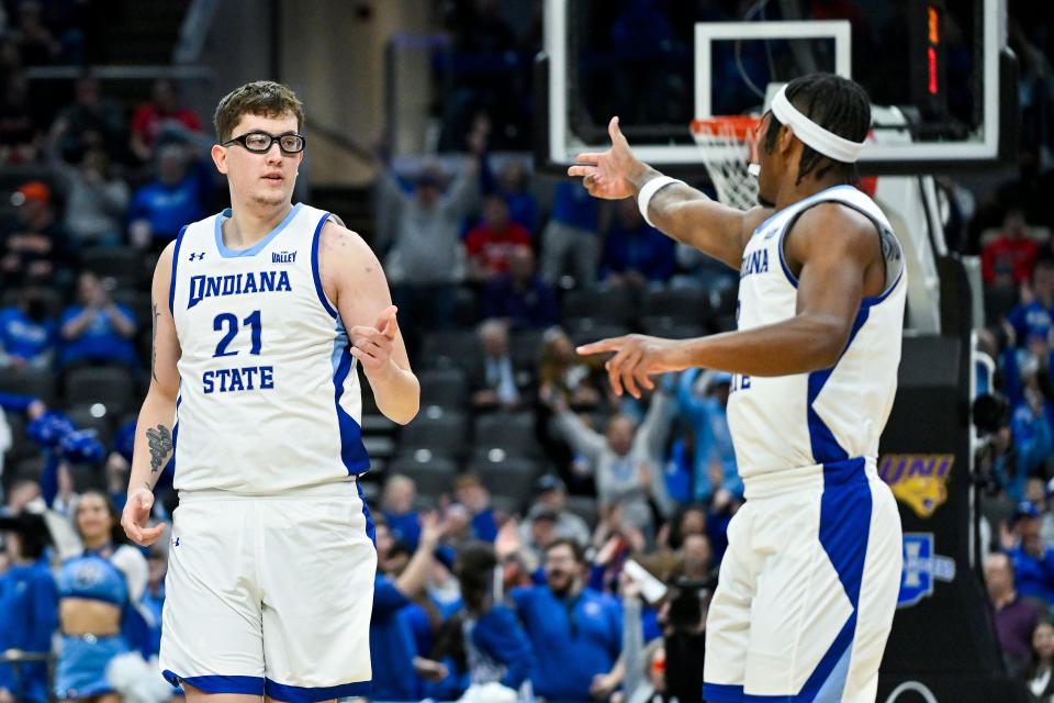 Mar 9, 2024; St. Louis, MO, USA; Indiana State Sycamores center Robbie Avila (21) celebrates with guard Ryan Conwell (3) after making a three pointer against the Northern Iowa Panthers during the first half of the Missouri Valley Conference Tournament semifinal game at Enterprise Center. Mandatory Credit: Jeff Curry-USA TODAY Sports