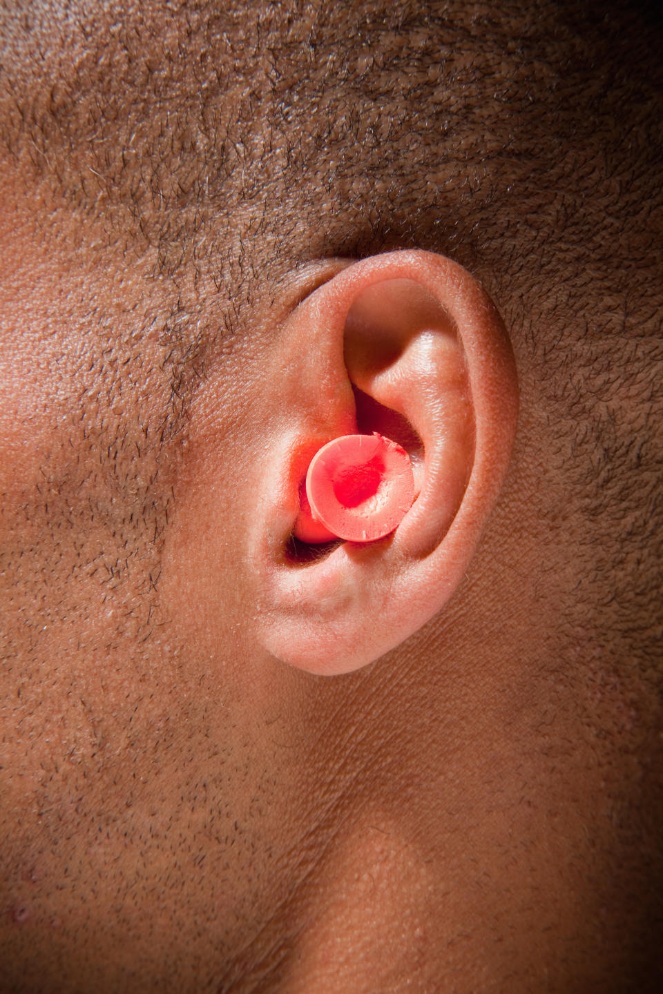 a ear plug in a person's ear