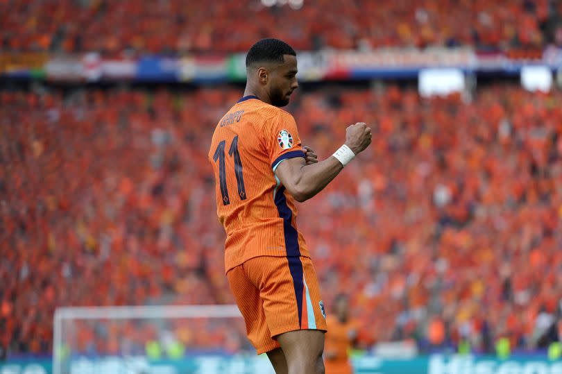 Cody Gakpo of the Netherlands celebrates after scoring his team`s first goal during the UEFA EURO 2024 group stage match between Netherlands and Austria at Olympiastadion on June 25, 2024 in Berlin, Germany.